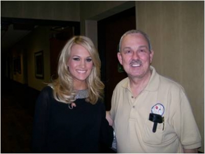 Our_Promotions_Director_Kenny_Morris_with_Carrie_Underwood.jpg