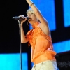 carrie-underwood-white-shorts-orange-top-cma-music-festival-6.jpg