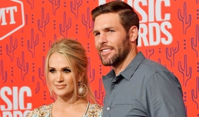 carrie-underwood-mike-fisher-cmt-awards-20062467-1280x0.jpeg