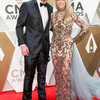 Mike-Fisher-and-Carrie-Underwood-PDA-Arrival-Red-Carpet-2019-CMA-Awards.jpg