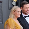 carrie-underwood-and-mike-fisher-attend-the-64th-annual-news-photo-1649229049.jpg