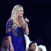 carrie-underwood-standing-on-a-stage-in-front-of-a-crowd-carrie-underwood-cma-awards__691512_.jpg