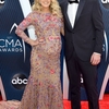 rs_634x1024-181114160907-634-carrie-underwood-mike-fisher-cma-me-111418.jpg