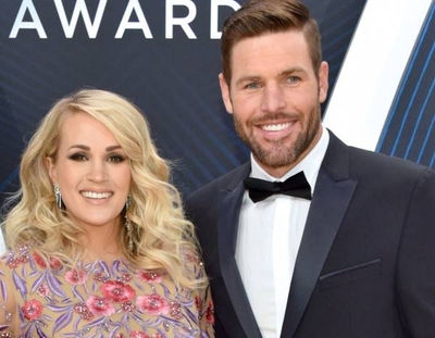 rs_600x600-181114160907-600-carrie-underwood-mike-fisher-cma-me-111418~0.jpg