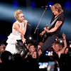 carrie-underwood-and-keith-urban-perform-onstage-during-the-2017-cmt-picture-id693582290.jpg