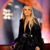 carrie-underwood-performs-at-2021-american-music-awards-in-nashville-11-21-2021-6.jpg